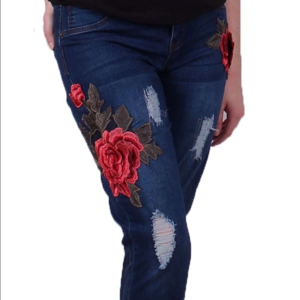 Embroidered ripped jeans